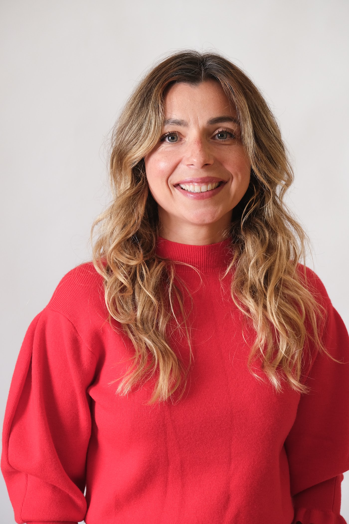 Portrait of Simone in a red sweater