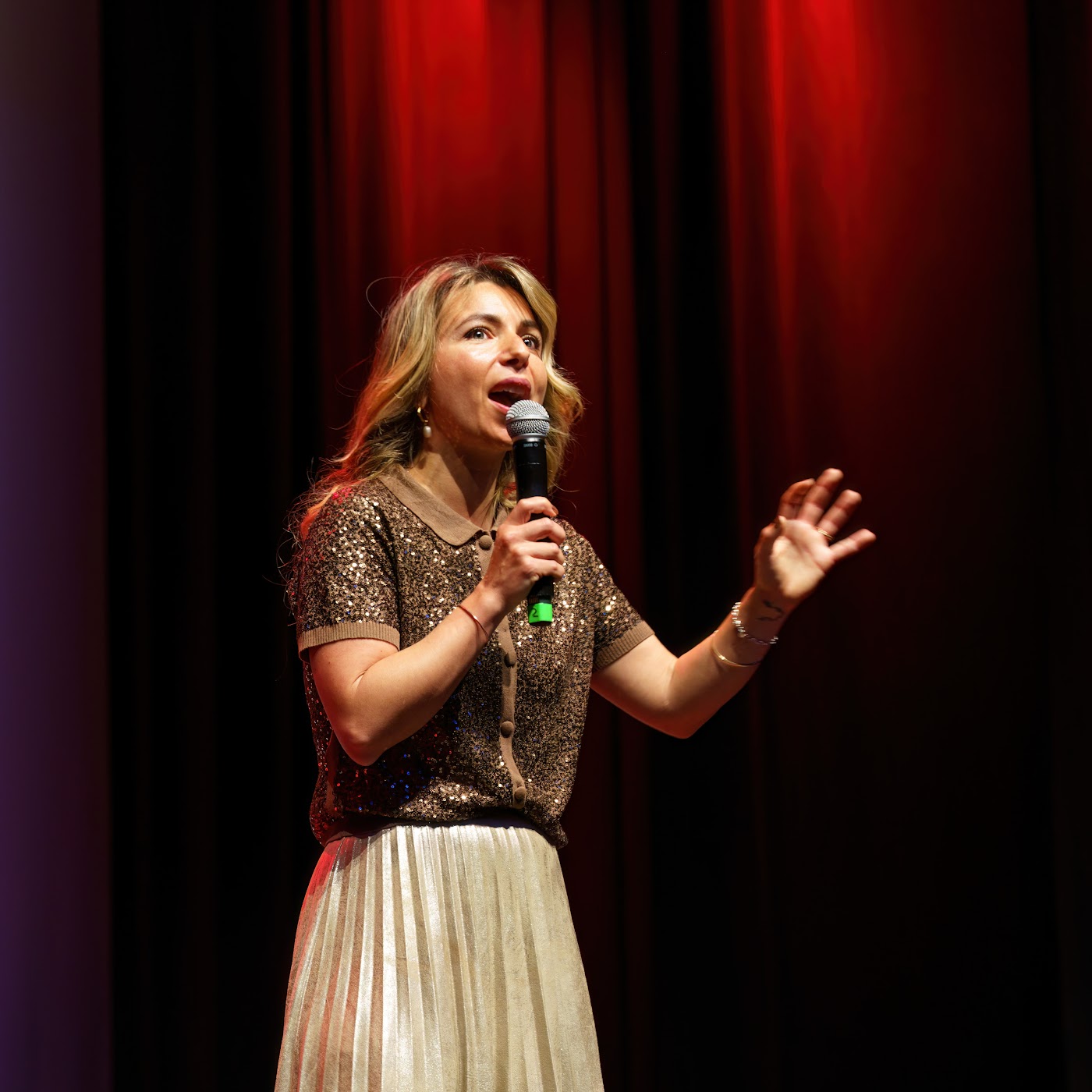 Simone speaking on the TEDx stage