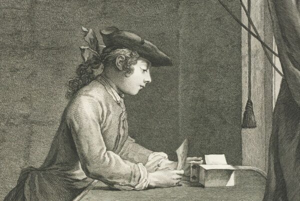 woman journaling with wheel of life diagram